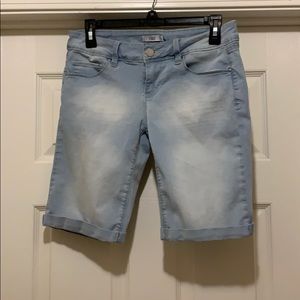 Longer blue jean shorts
